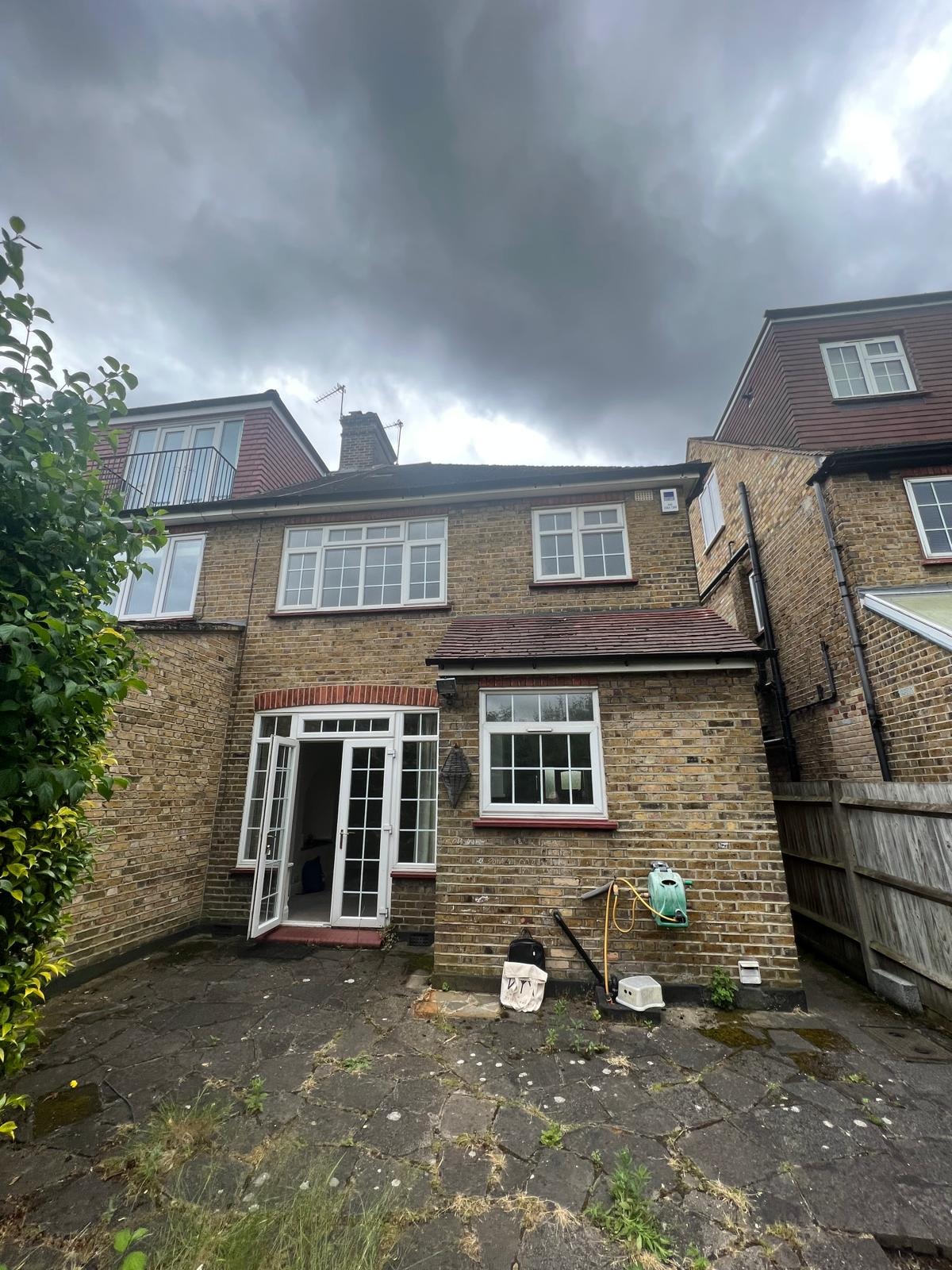 Rear exterior before renovation works in Barnes.