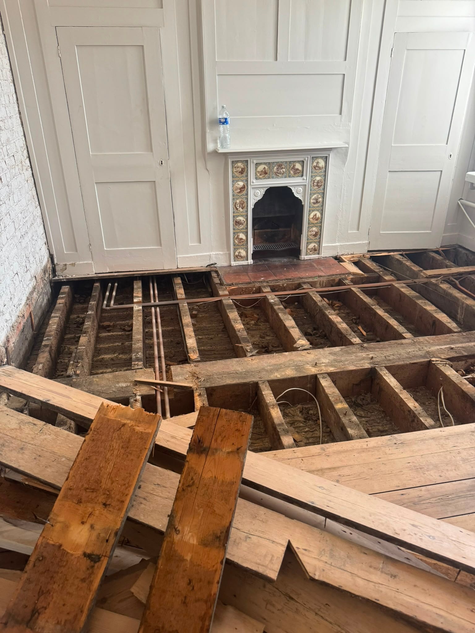 Floor joists exposed during the Chertsey bathroom works.