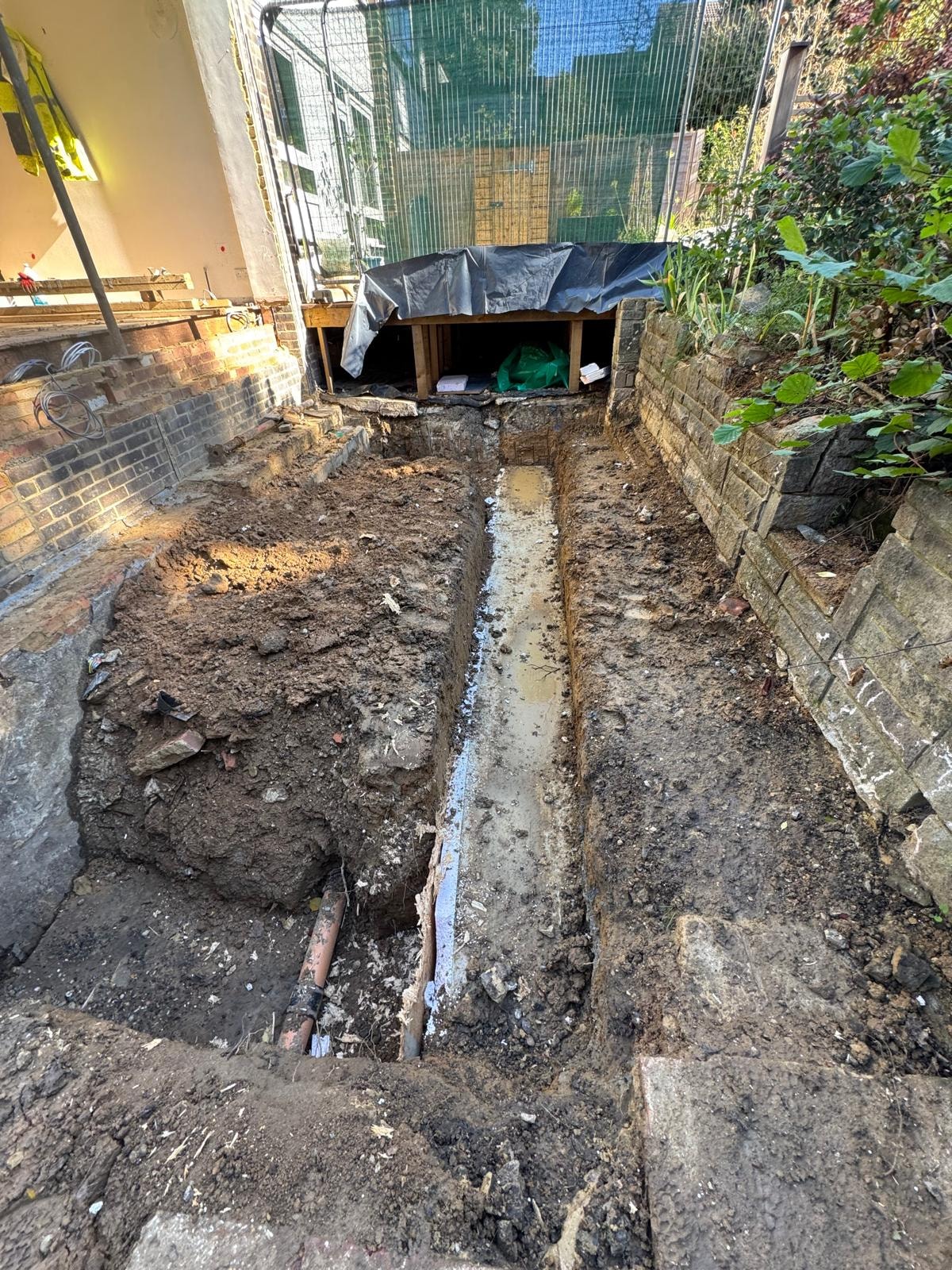 Foundation trench during the Croydon townhouse works.