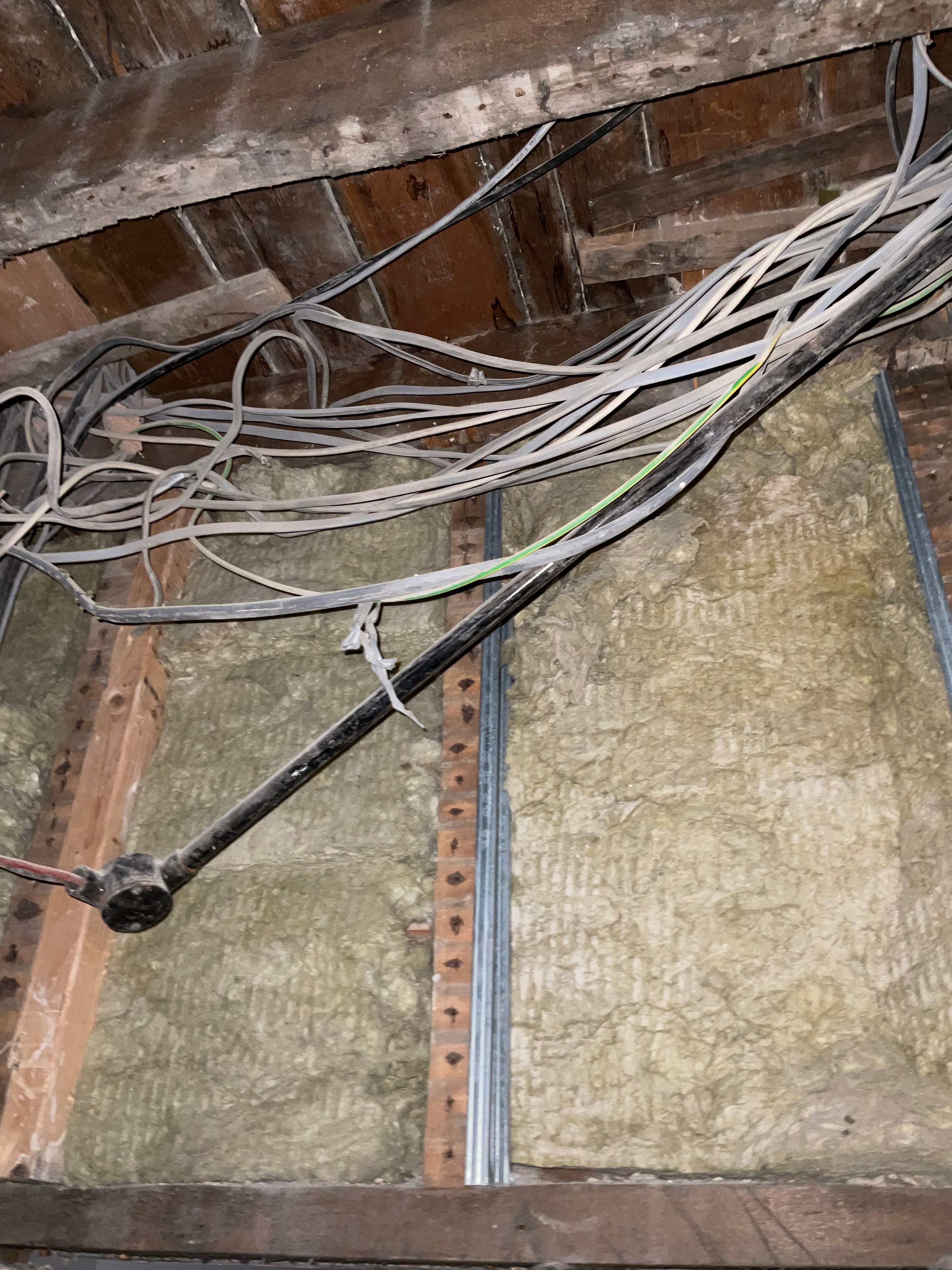 Exposed services during the Islington townhouse strip-out.
