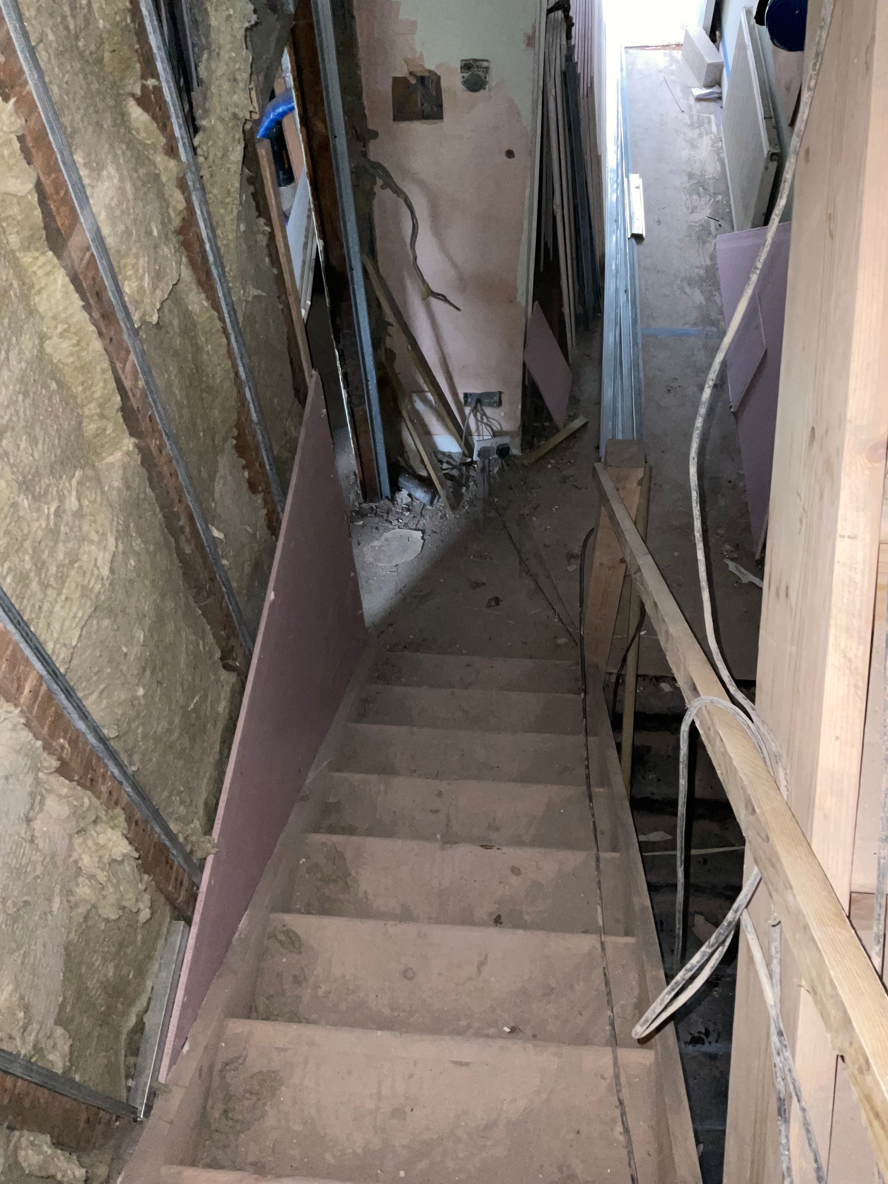Stairwell strip-out at the Islington townhouse.