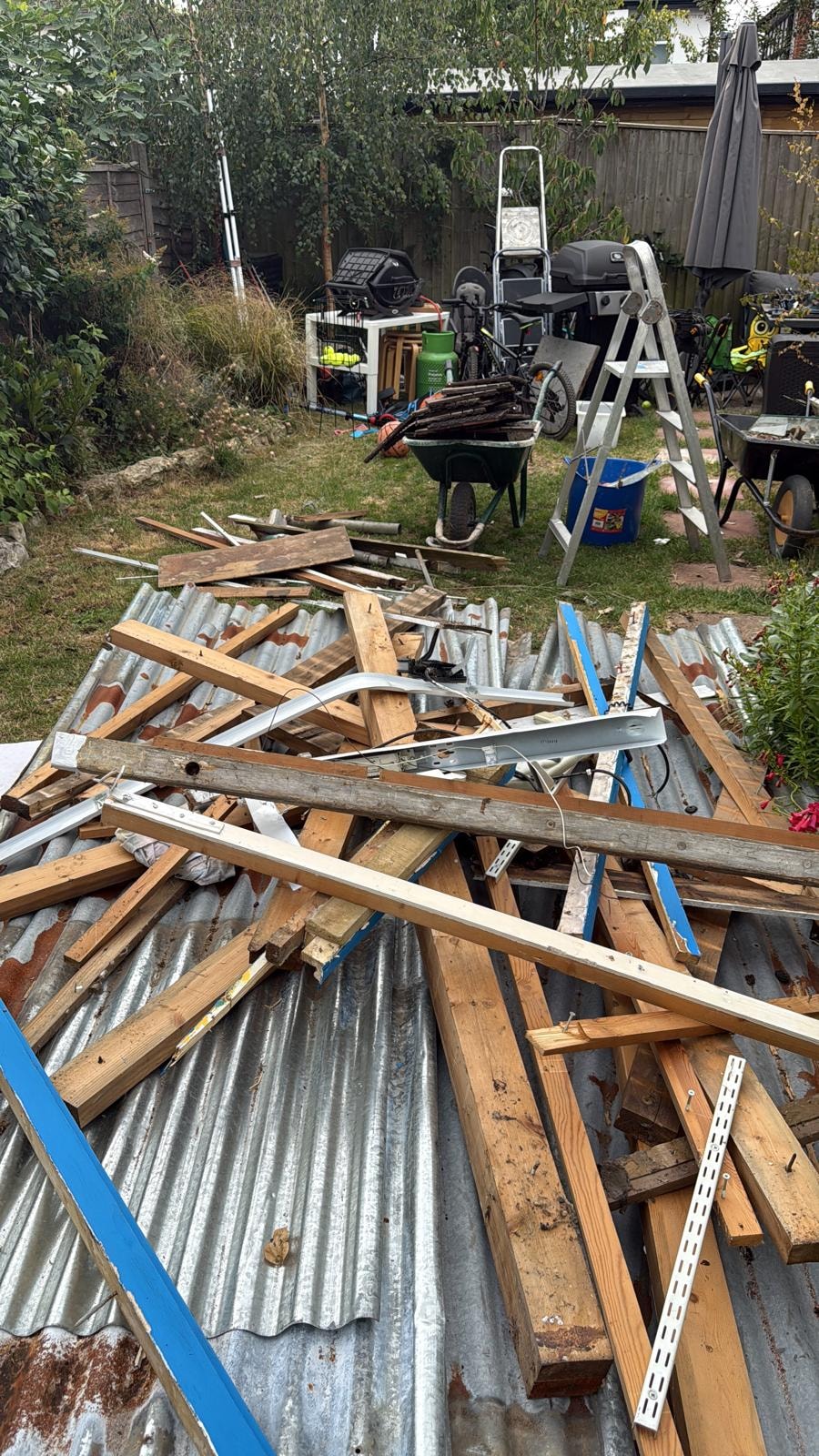 Roof strip-out and segregated timber at the Kingston garage site.