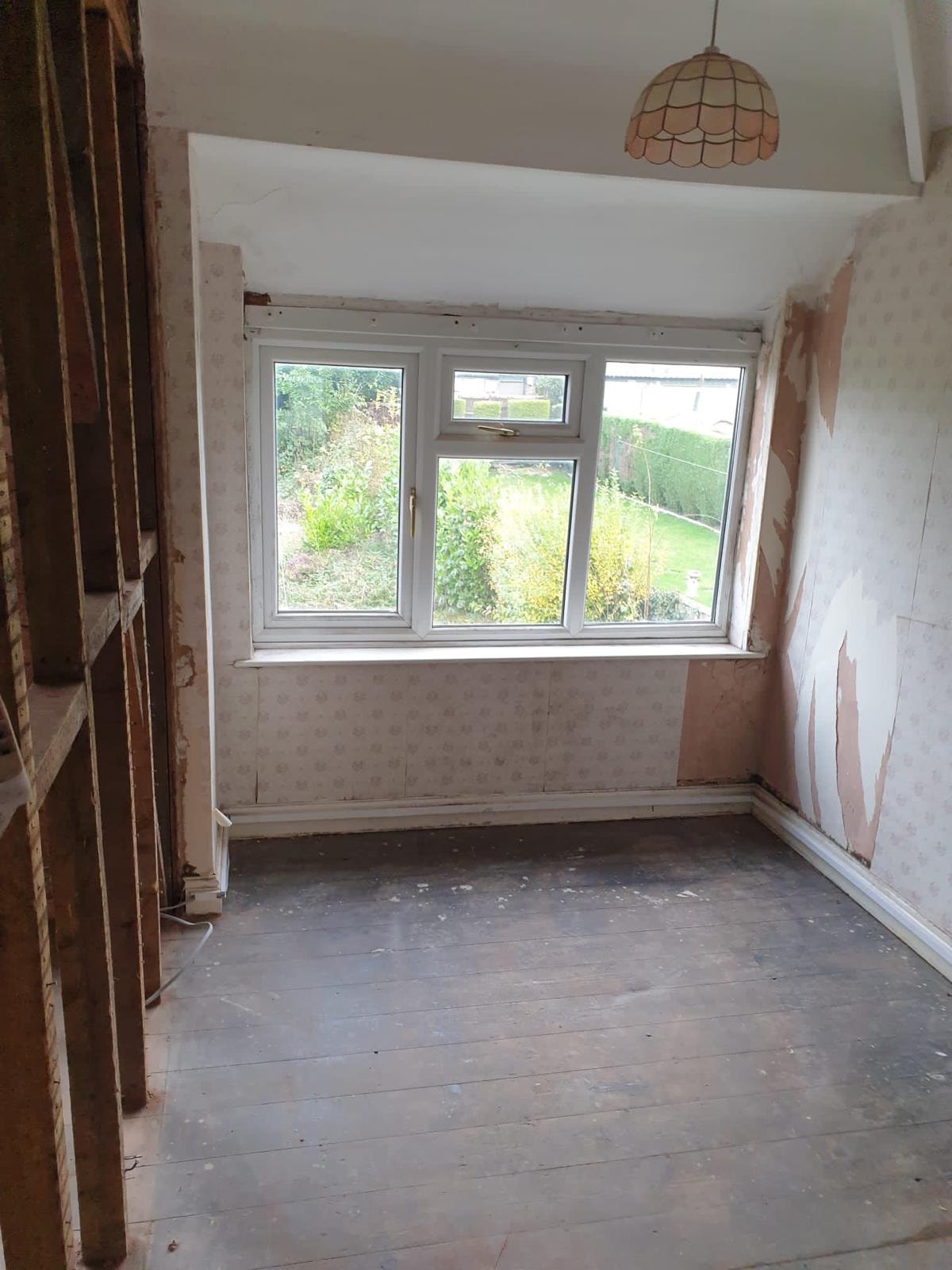 Bedroom strip-out in progress in the London Victorian terrace.