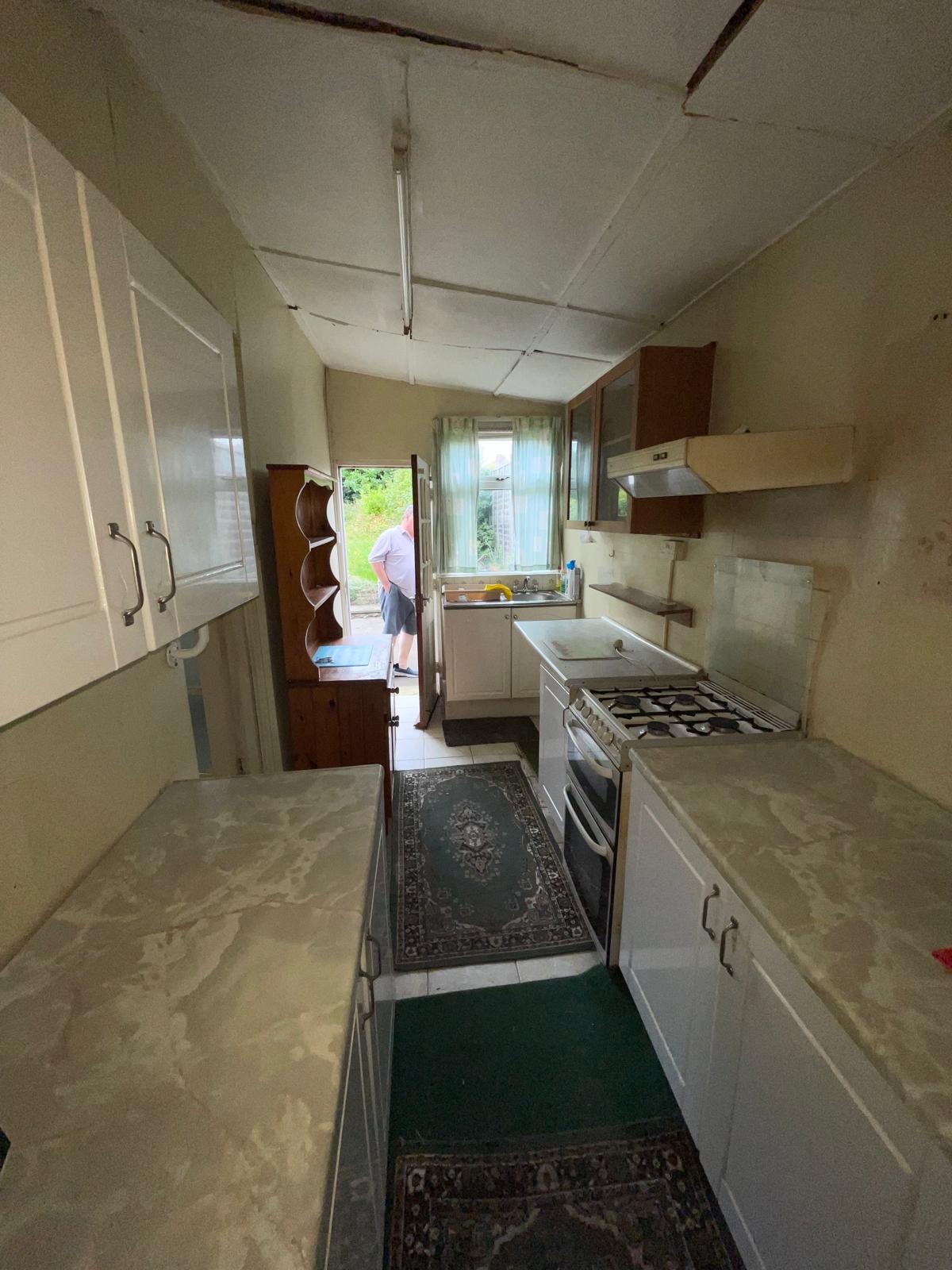 Kitchen in the London Victorian terrace before strip-out.