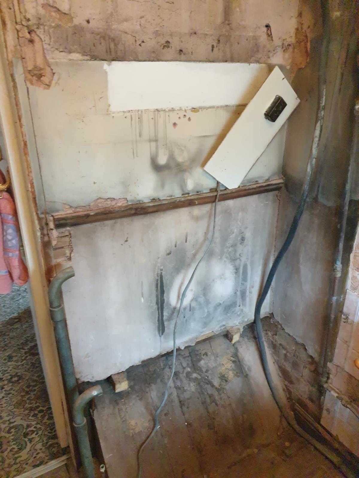 Internal strip-out with services and wall areas exposed in the London Victorian terrace.