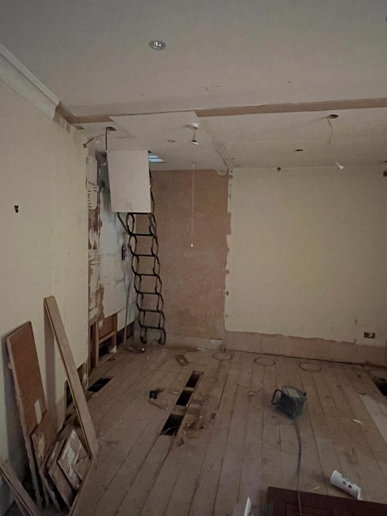 Wall strip-out at the Mayfair mews property.