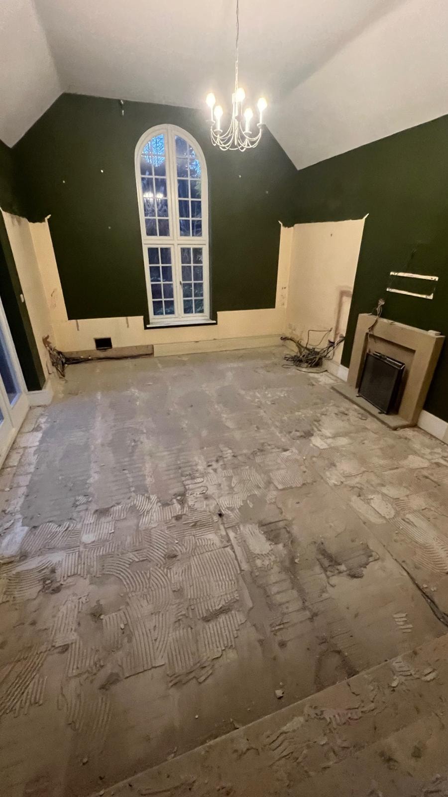 Cleared room following strip-out works in Oxshott.