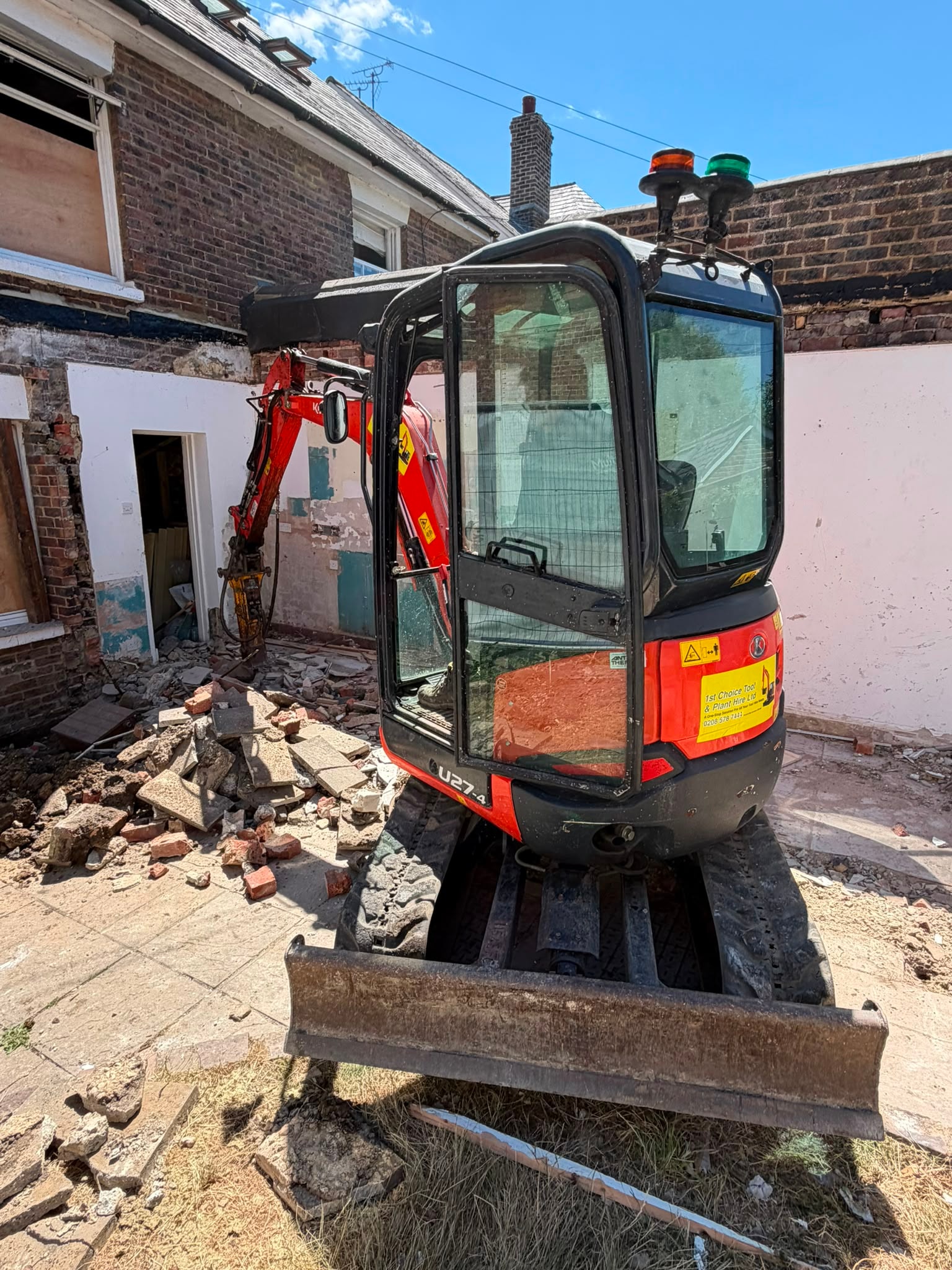 Excavator on site during the Pulborough extension demolition.