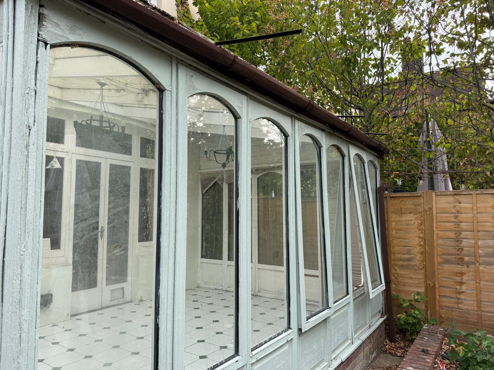 Side elevation of the conservatory showing glazing condition before removal
