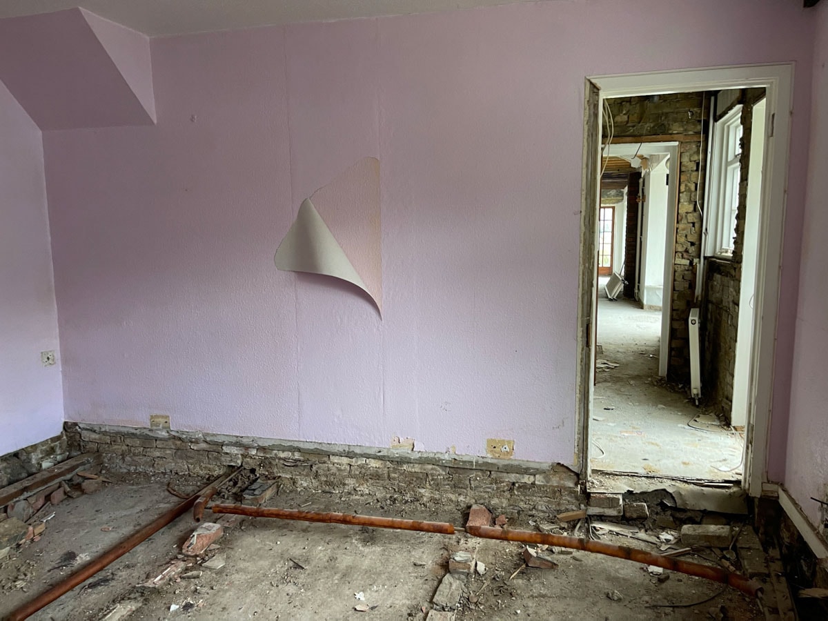 Cleared room following strip-out work at the Walton-on-Thames cottage.