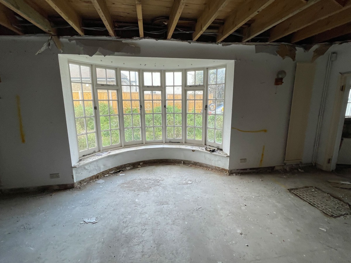 Exposed original fabric during the Walton-on-Thames cottage strip-out.