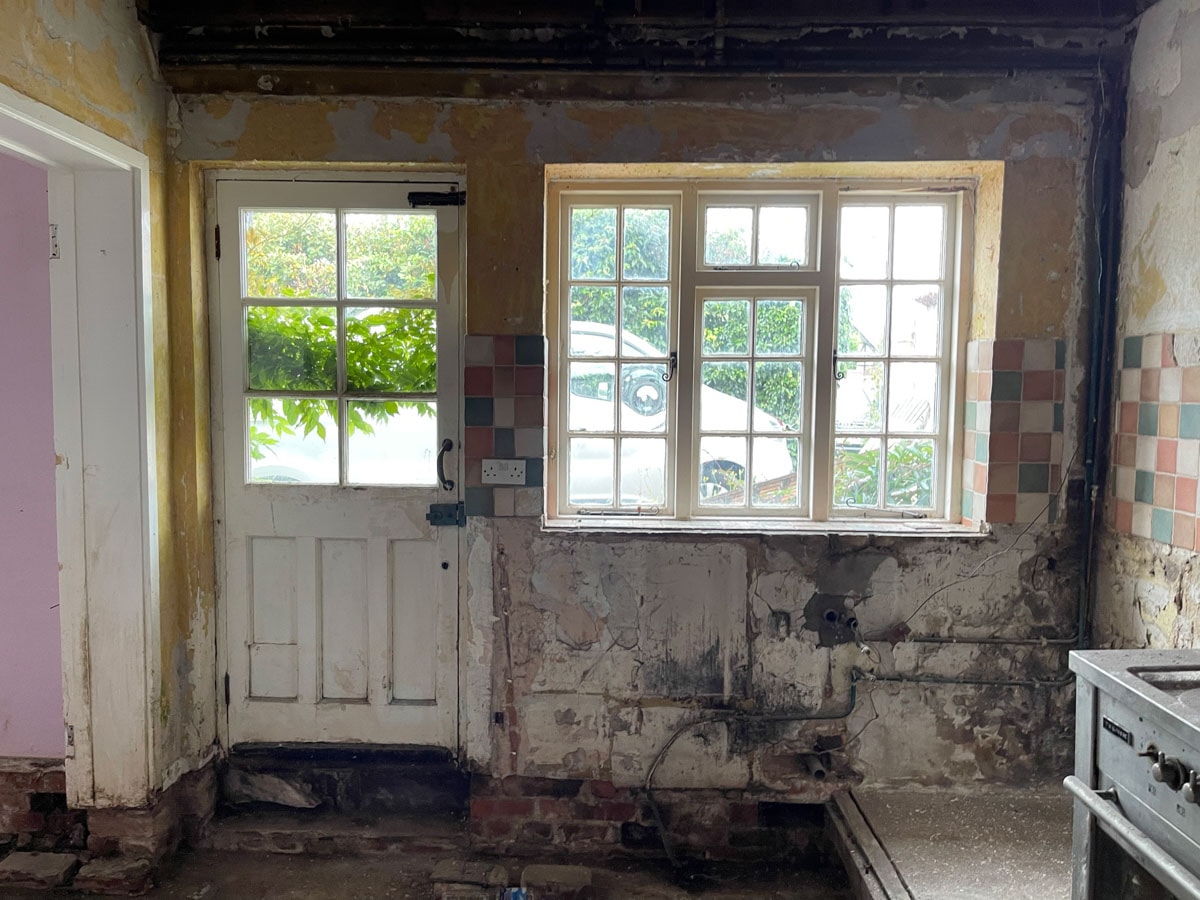 Kitchen before strip-out at the Walton-on-Thames cottage.